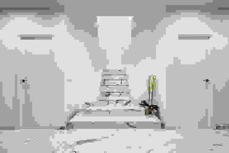 Escalera interior de mármol. OOIIO Arquitectura Escaleras Piedra Blanco escalera,suelo de mármol,distribuidor,espacio elegante