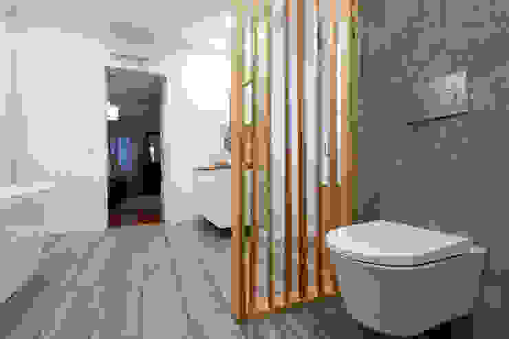 Reconstrução de moradia antiga Atelier d'Maison Casas de banho modernas