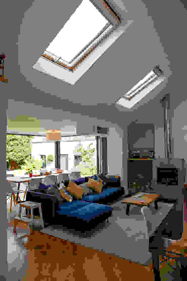 View of open-plan living and dining areas dwell design ห้องนั่งเล่น
