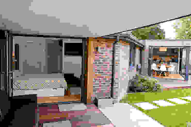 View of covered outdoor seating area, master bedroom and bi-folding doors dwell design บ้านและที่อยู่อาศัย