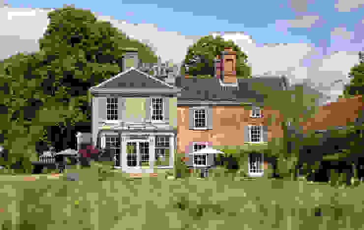 The view from the garden of a bespoke orangery on a beautiful Georgian home Vale Garden Houses Konservatori Klasik Kayu White