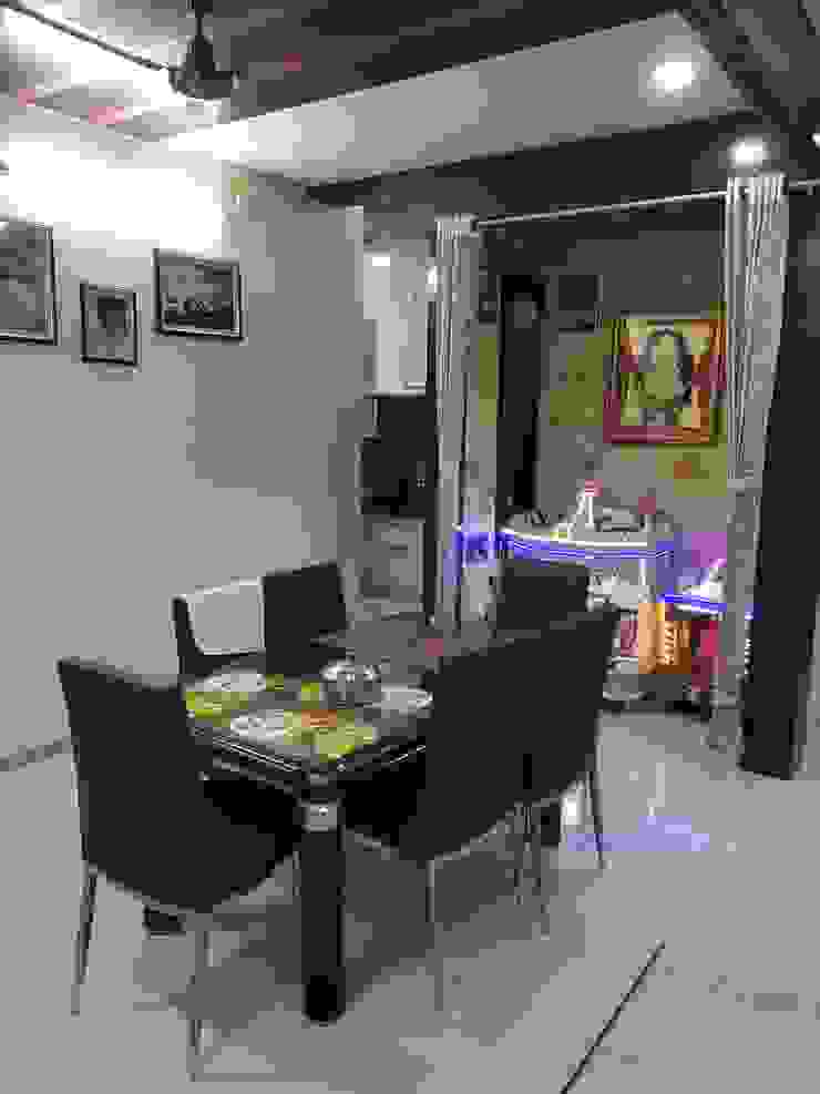 Ragiben 'A' DESIGN ASSOCIATES Modern dining room