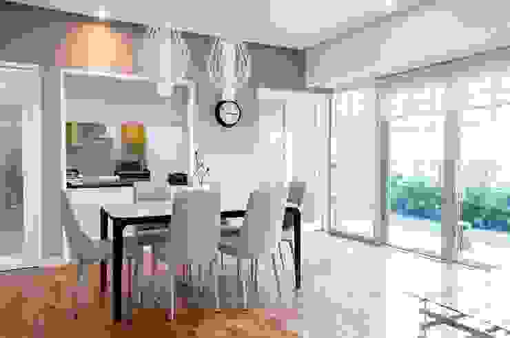 The Residences At Greenbelt D3ID Design and Build Modern dining room Concrete Beige