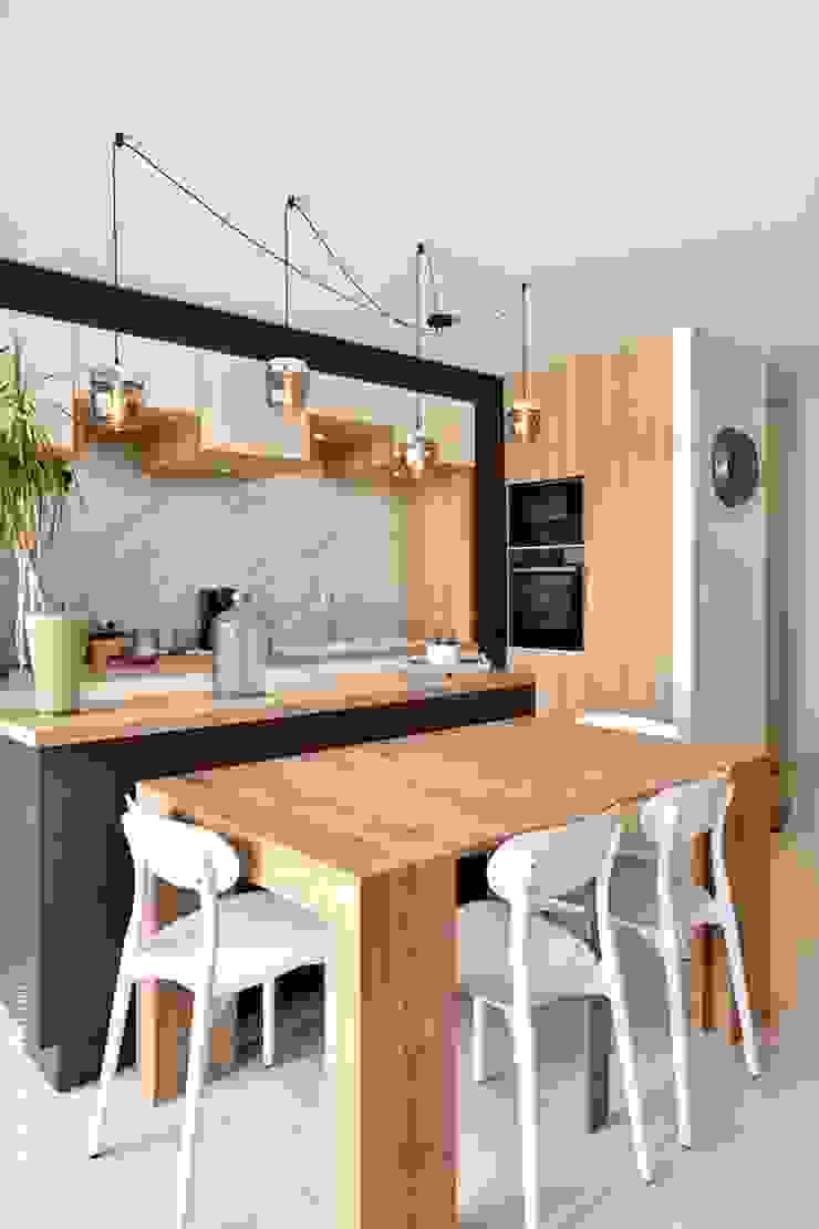 Une cuisine bi-colore Thierry Allard photographe Cuisine intégrée Bois composite Beige cuisine,beige,noire