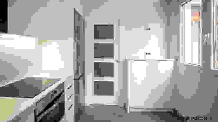 cocina blanca lacada con encimera de