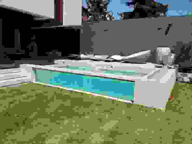 Piscina con Cristal Laminado INGENIERIA Y DISEÑO EN CRISTAL, S.A. DE C.V. Albercas de jardín Vidrio Transparente piscinadecristal,,albercadecristal