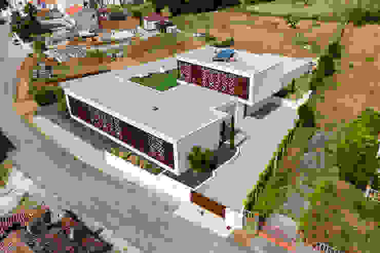 Aerial View of the Villa Pascal Millasseau Construction Maison individuelle aerial view drone house steel corten floral solar panels entry garage perspective villa high-end modern elegant