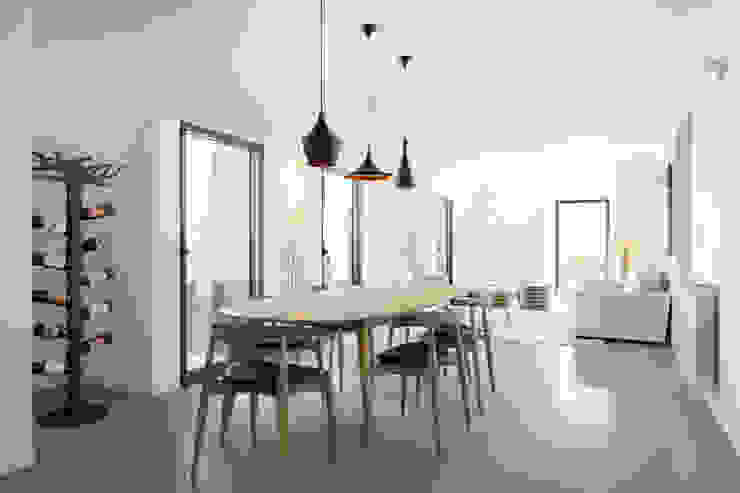 Apartamento na Lapa Atelier Central Arquitectos Salas de jantar minimalistas Cinzento