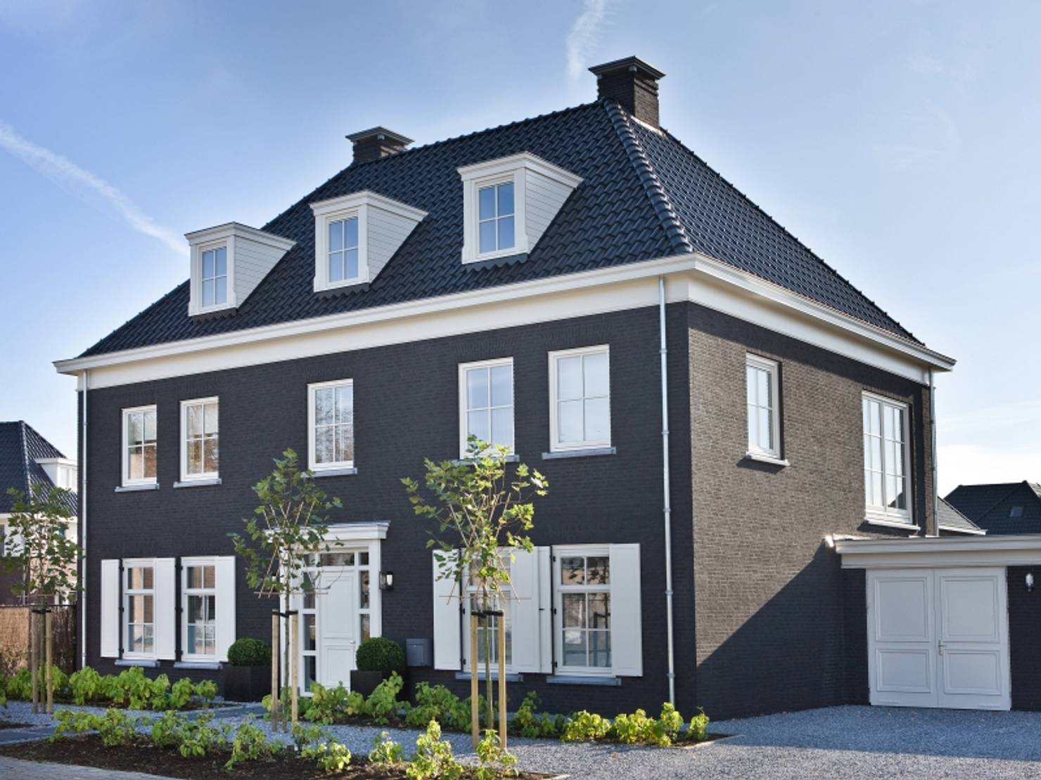 Голландский дом из кирпича- фотографии
				