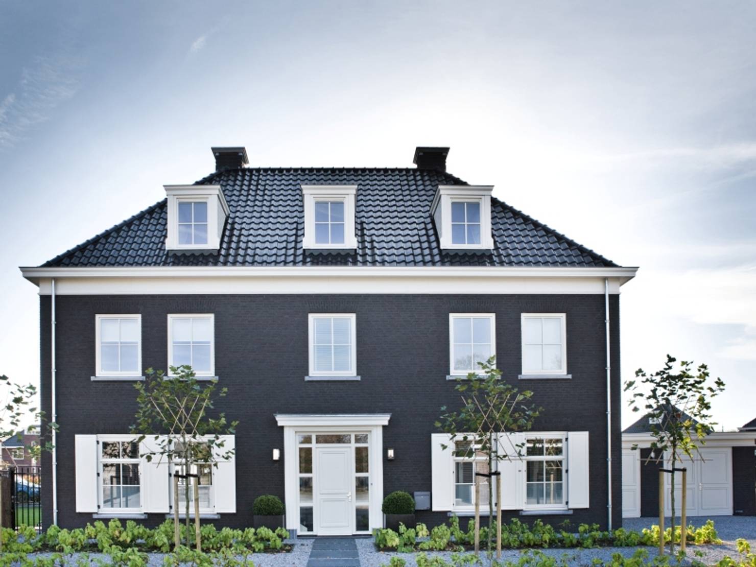 Голландский дом из кирпича- фотографии
				