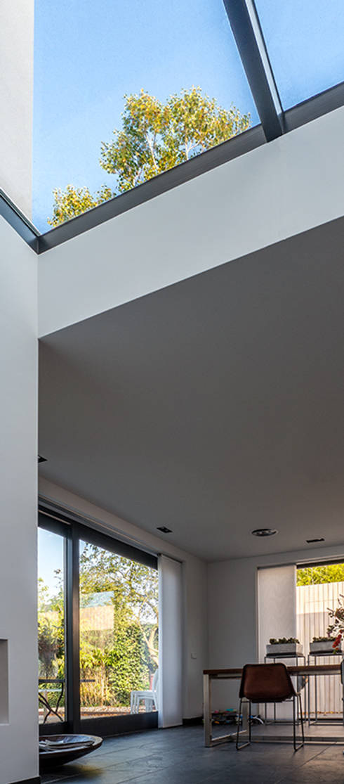 Luxe renovatie met zwevende dakopbouw, maatwerk keuken met zwevend ...
