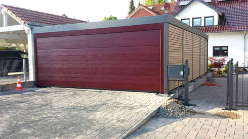 Doppelcarport mit Garagentor von Carport-Schmiede GmbH + Co. KG | homify Doppelcarport mit Garagentor von Carport-Schmiede GmbH + Co. KG | homify
