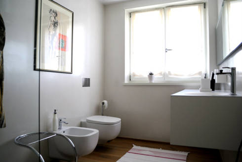 Bagni in resina e cucina yellow style di Due Punto Zero | homify Bagni in resina e cucina yellow style di Due Punto Zero | homify