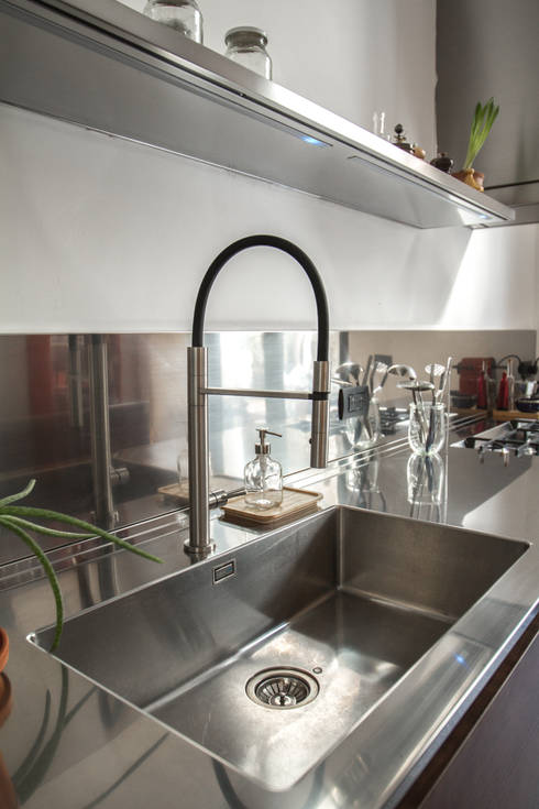 Isola cucina in acciaio con ruote