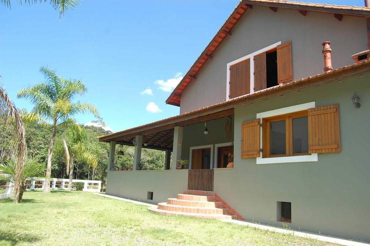 Casas de estilo  por arquiteto