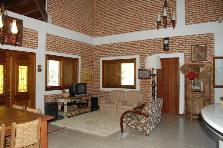 Salas / recibidores de estilo  por arquiteto