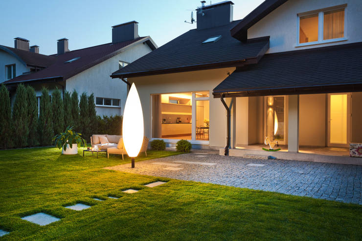 10 ideas geniales para decorar tu patio con adoquín y piedra