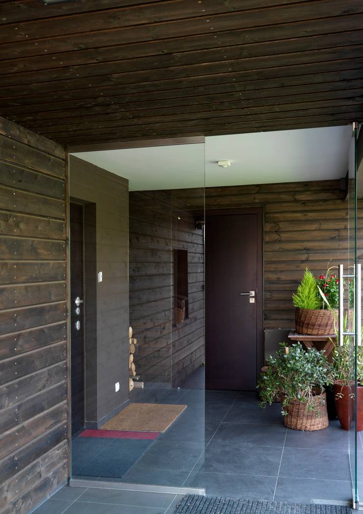 Couloir et hall d'entrée de style  par WIZJA