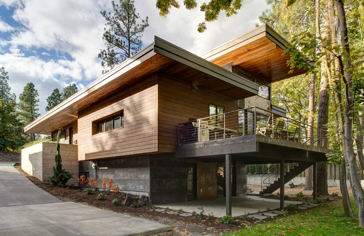 Casas de estilo  por Uptic Studios