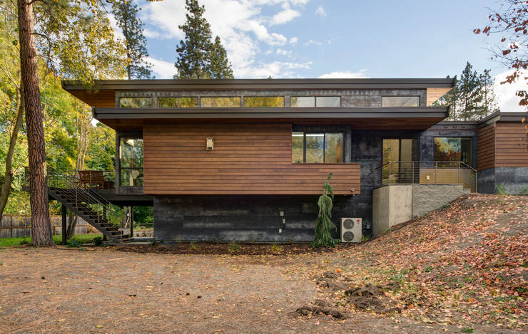 Casas de estilo  por Uptic Studios