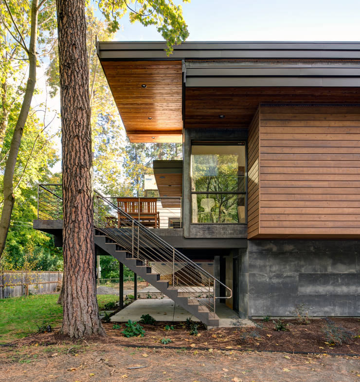 Casas de estilo  por Uptic Studios