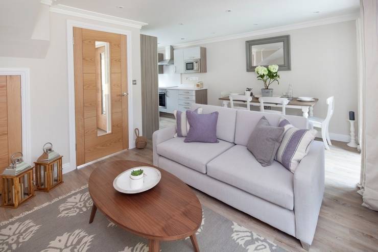 Salas / recibidores de estilo  por Emma & Eve Interior Design Ltd