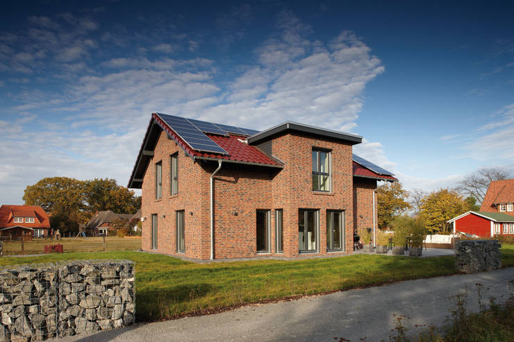 Projekty,  Dom jednorodzinny zaprojektowane przez FingerHaus GmbH - Bauunternehmen in Frankenberg (Eder)