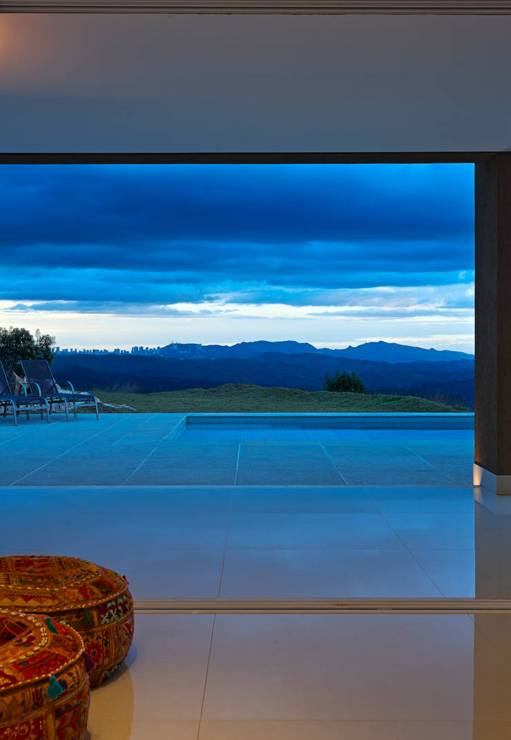 Vista para os fundos: Casas  por Lage Caporali Arquitetas Associadas