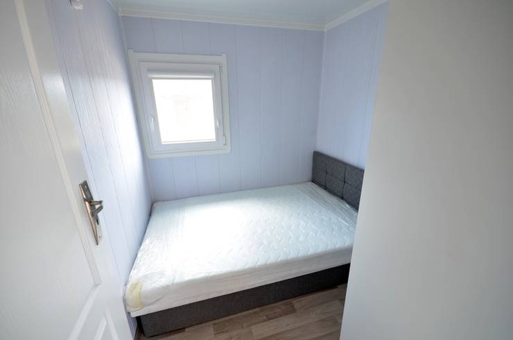 Dormitorios de estilo  por Letniskowo.pl s.c. Jacek Solka, Marek Garkowski