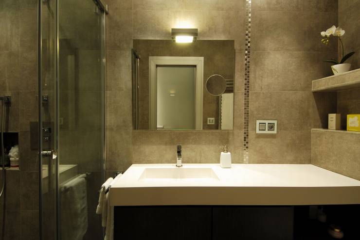 Casas de banho  por MADG Architect