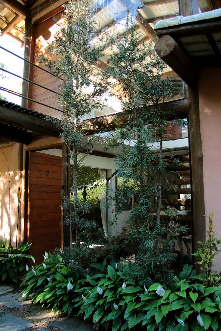 Casas de estilo  por Arquitetamos Escritório Autônomo