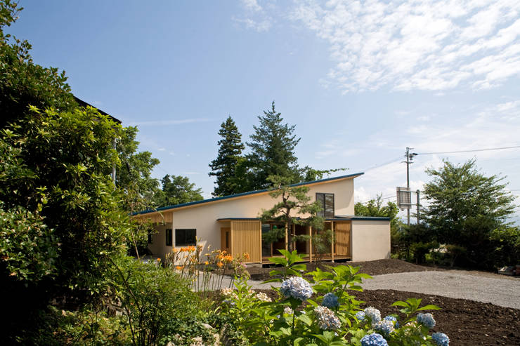 Casas de estilo  por 尾日向辰文建築設計事務所