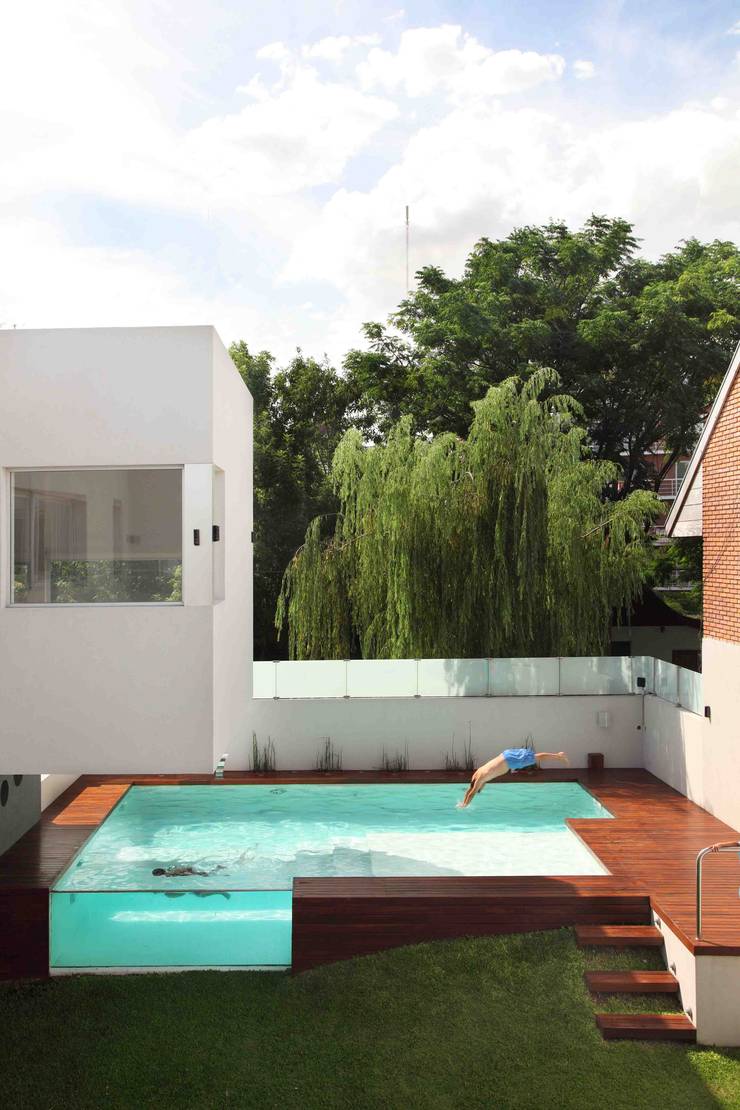 Casa Devoto: Piletas de estilo  por Remy Arquitectos,Moderno   