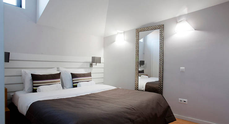 Edifício habitacional: Quartos ecléticos por Alves Dias arquitetos