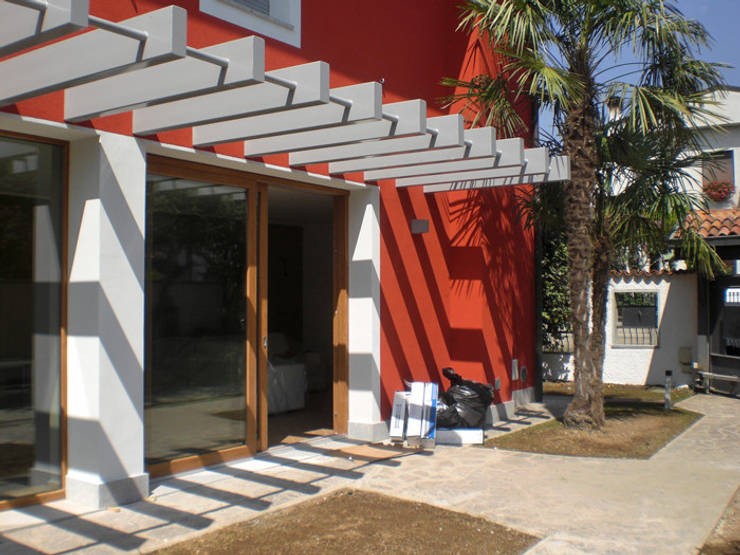 Villa_FV: Case in stile  di Studio GIOLA | Casorezzo MI, Moderno Ferro / Acciaio  
