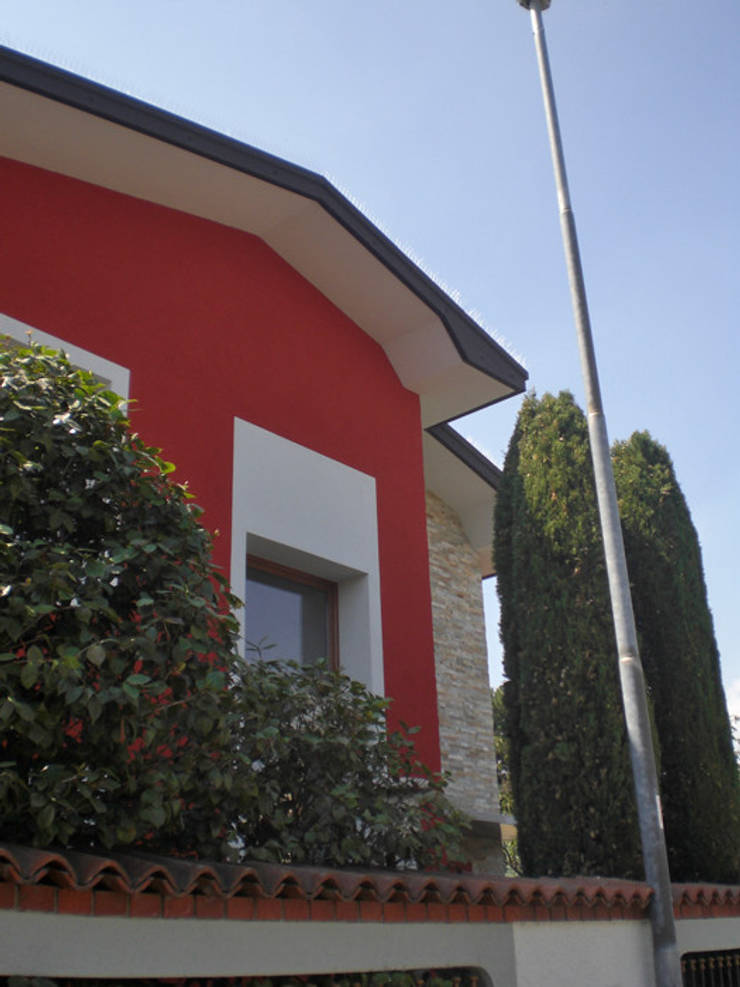 Villa_FV: Case in stile  di Studio GIOLA | Casorezzo MI, Moderno Pietra  