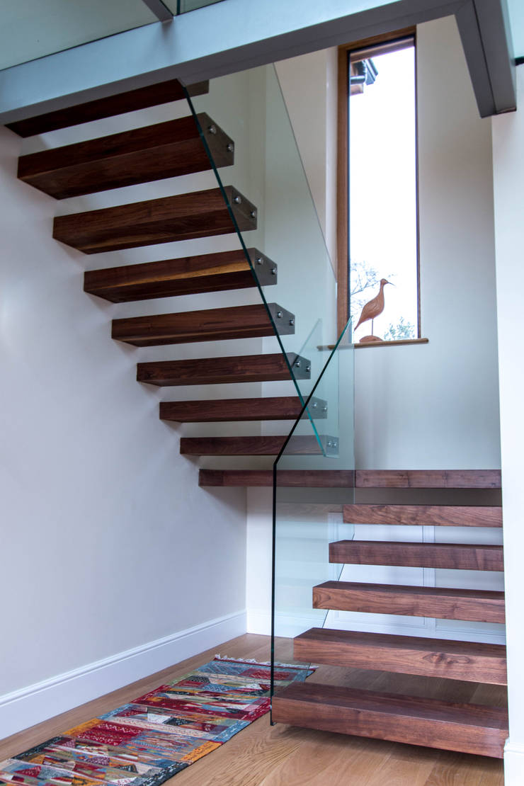 metal construction floating treads staircase with gl
