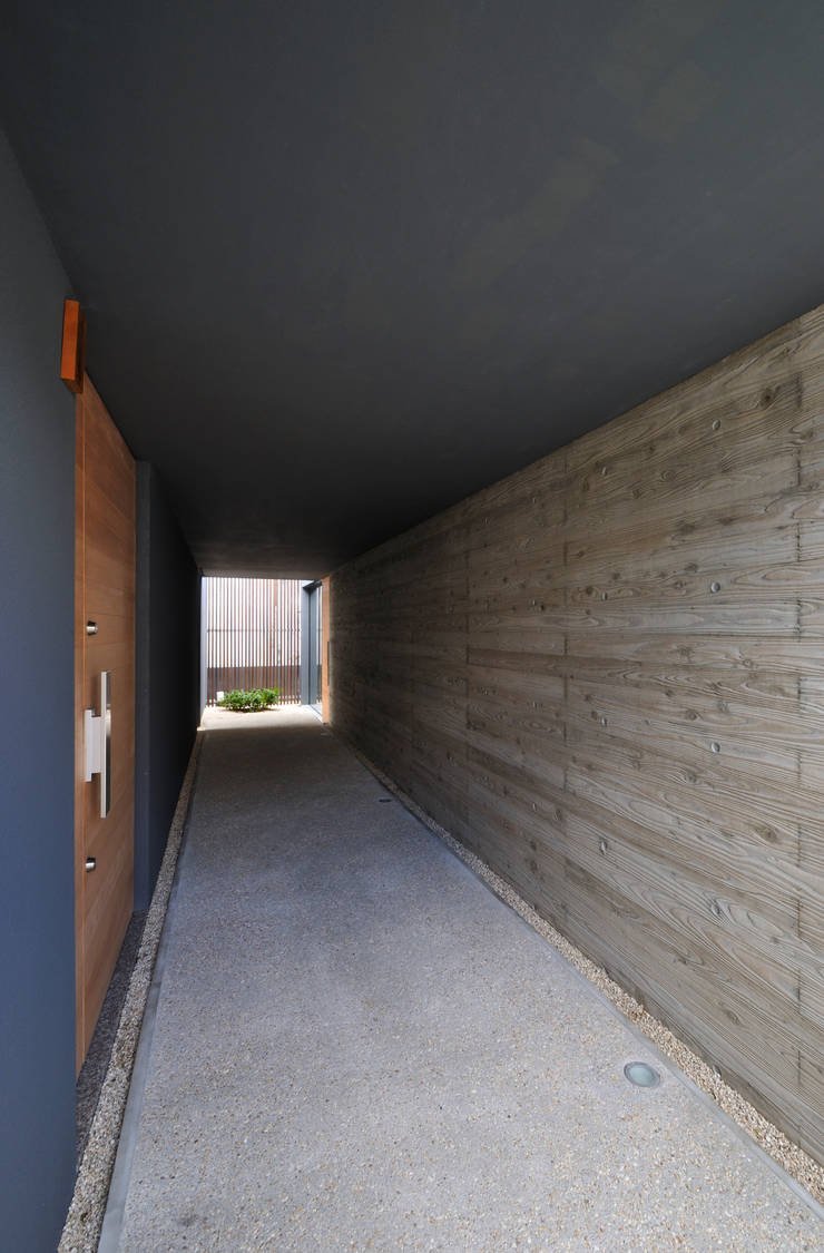Pasillos y recibidores de estilo  por 株式会社クレールアーキラボ, Moderno Concreto reforzado  