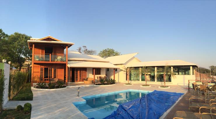  de estilo  por CASA & CAMPO - Casas pré-fabricadas em madeiras