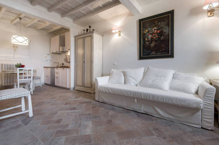  غرفة المعيشة تنفيذ STUDIO ARCHIFIRENZE