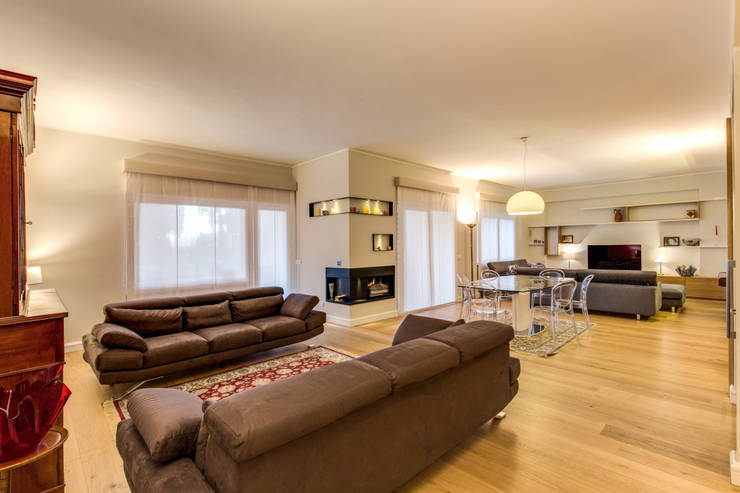 Salas / recibidores de estilo  por MOB ARCHITECTS