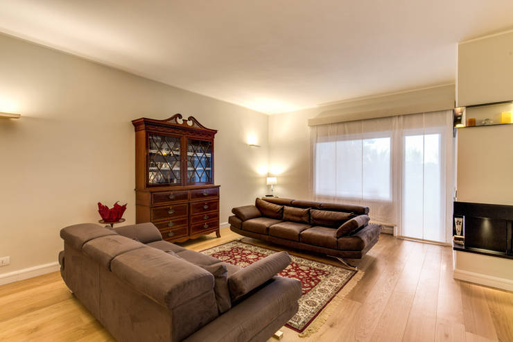 Salas / recibidores de estilo  por MOB ARCHITECTS