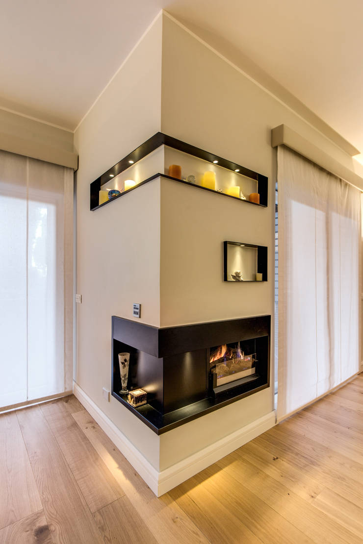 Salas / recibidores de estilo  por MOB ARCHITECTS