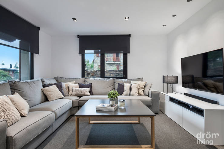 CASA EN LLÍVIA: MINIMALISMO Y CALIDEZ:  de estilo  de Dröm Living, Minimalista  