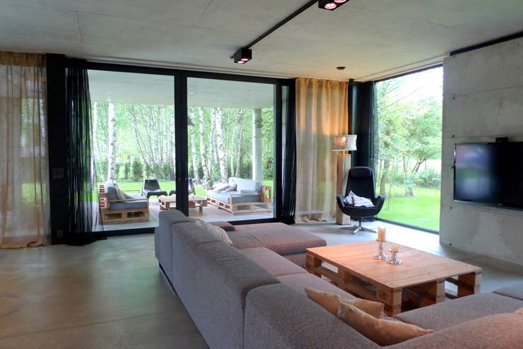 Salas / recibidores de estilo  por seweryn pracownia