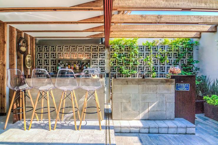 15 ideas fantásticas para decorar las paredes de tu patio