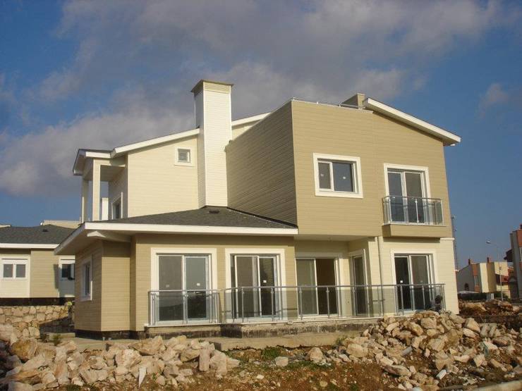 Casas de estilo  por Murat  Kaya Mimarlik Ltd. Sti.