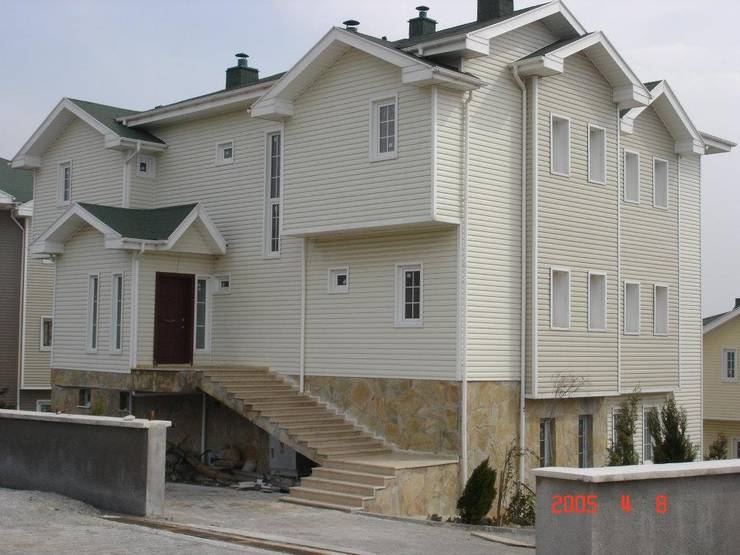 Casas de estilo  por Murat  Kaya Mimarlik Ltd. Sti.