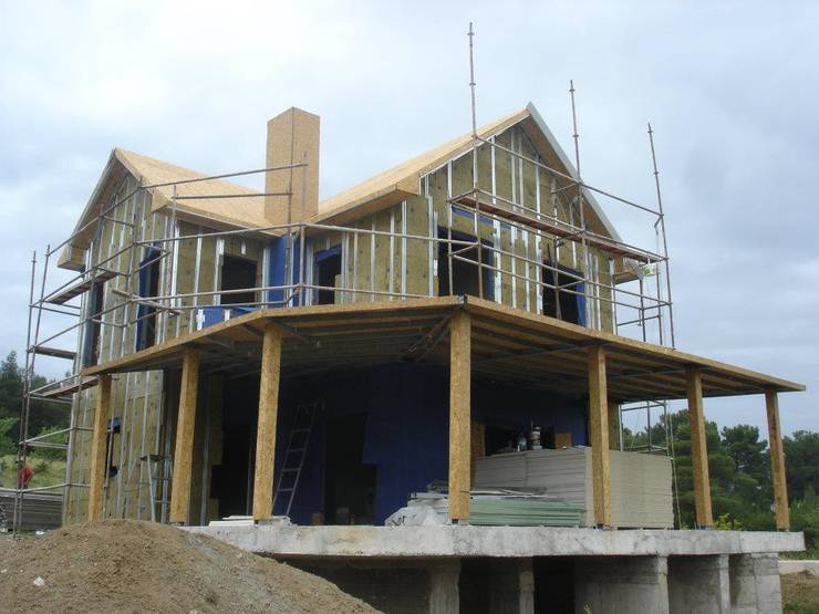 Casas de estilo  por Murat  Kaya Mimarlik Ltd. Sti.