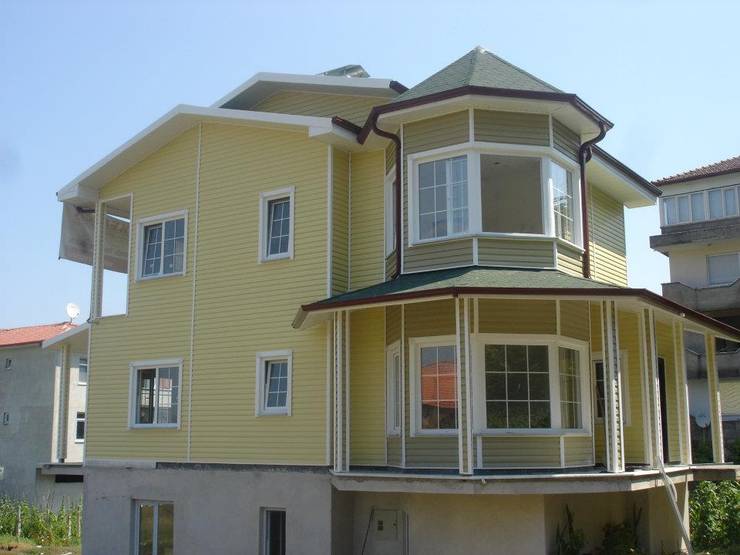 Casas de estilo  por Murat  Kaya Mimarlik Ltd. Sti.